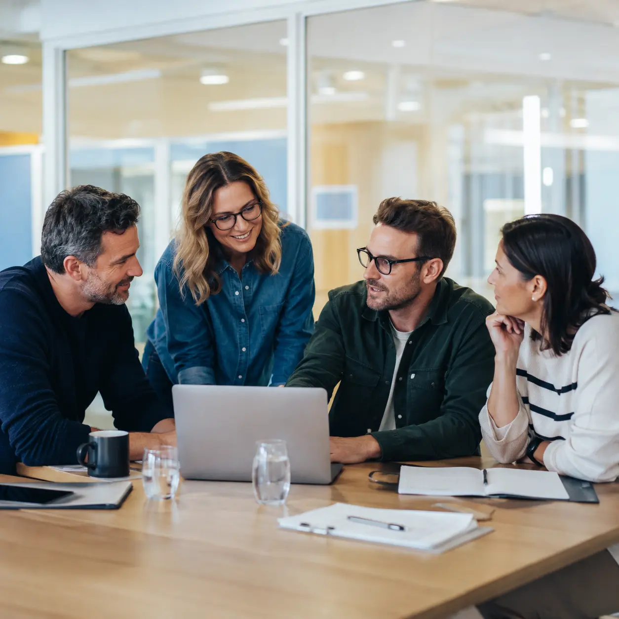 Modern agency team collaborating together in a creative studio